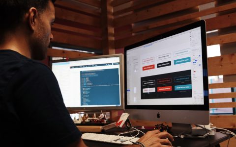 man using Apple computer